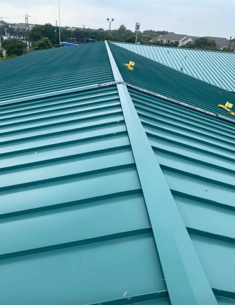 Green commercial metal roof ridge and valley for Metal Roof Repair in Wellington